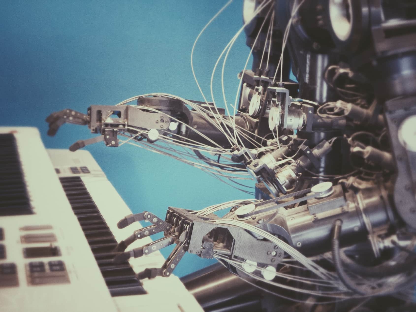 AI's potential in creating art: A robot being programmed to play the piano