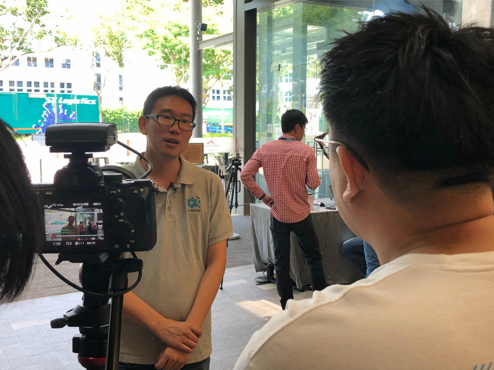 Mr Chong Jiayi, the engineer who led the SNPS team in the project speaking in front of a camera.