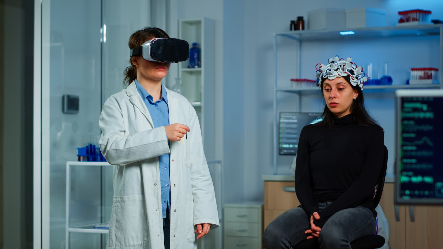 Doctor using VR headset to analyse the patient's brain anatomy before taking any medical action.